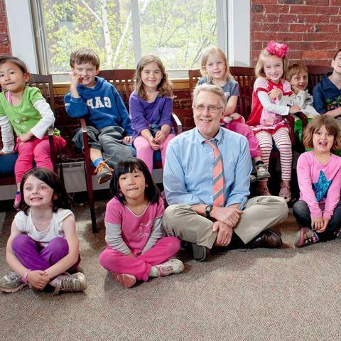 A teacher with young students