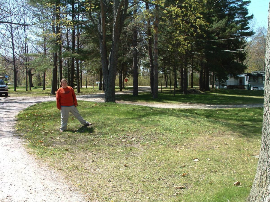 Archaeologist Meghan Howey stands on a burial mound in Michigan